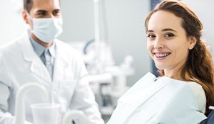 Smiling orthodontic patient in treatment chair