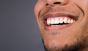 Man with healthy gums and teeth smiling