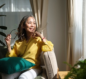 a woman relaxing on her couch