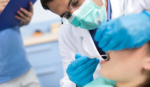 dentist conducting oral examination